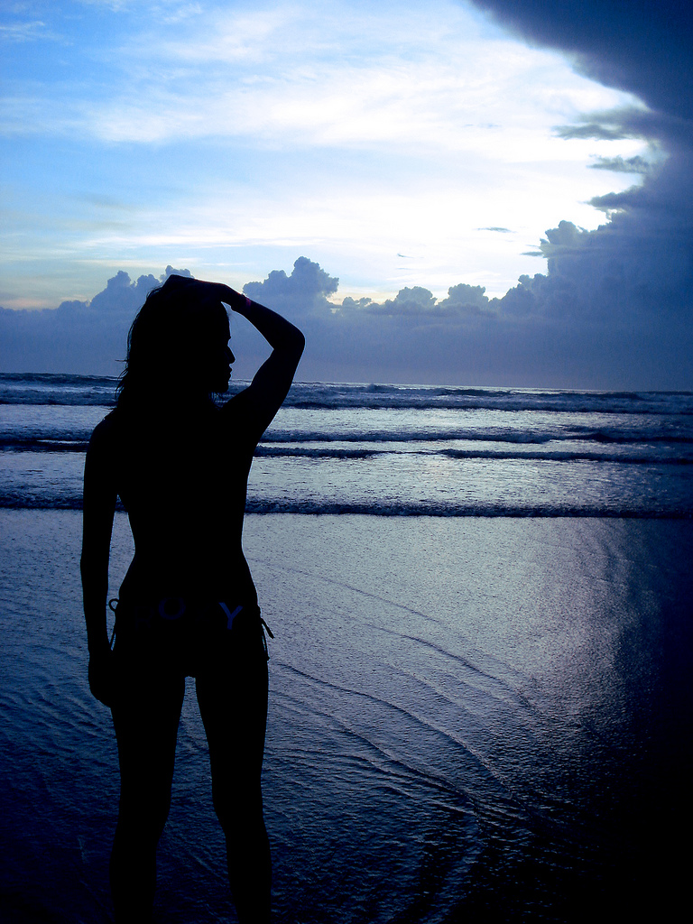 Silhouette of Girl at Beach, Alone