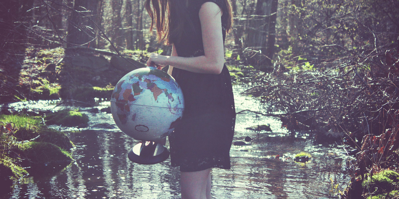 Girl holding globe