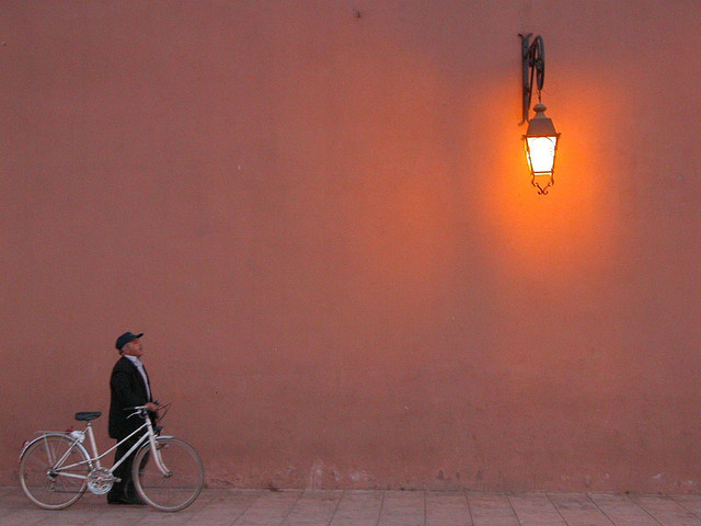 Man with bicycle in Marrakech, Morocco