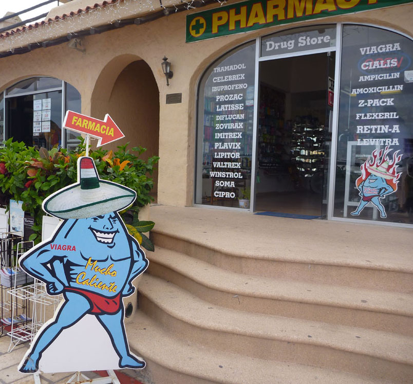 Sign: Farmacia de Mucho Caliente, Cabo San Lucas, Mexico