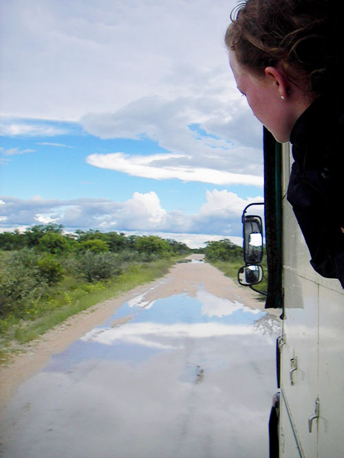 Girl with head outside bus window in Namibia