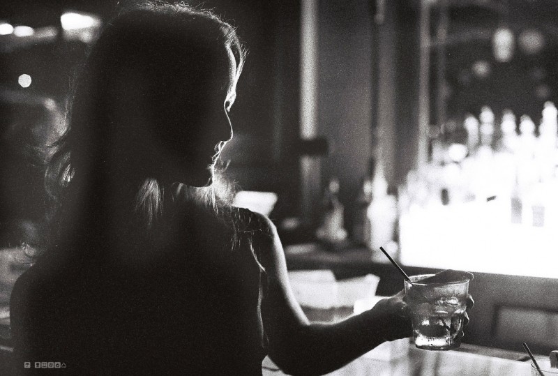 Woman with a Drink at Cuba Libre Night Club in Jacksonville, Florida Woman with a Drink at Cuba Libre Night Club in Jacksonville, Florida